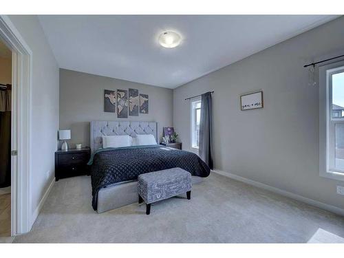 55 Henderson Crescent, Penhold, AB - Indoor Photo Showing Bedroom