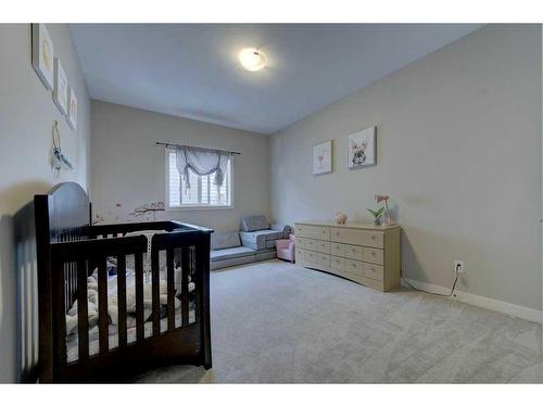 55 Henderson Crescent, Penhold, AB - Indoor Photo Showing Bedroom