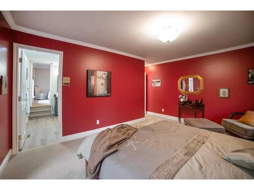 121 Bailey Avenue, Rural Camrose County, AB - Indoor Photo Showing Bedroom