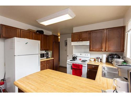 97 Card Crescent, Red Deer, AB - Indoor Photo Showing Kitchen With Double Sink