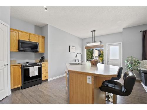 60 Jarvis Avenue, Red Deer, AB - Indoor Photo Showing Kitchen With Double Sink