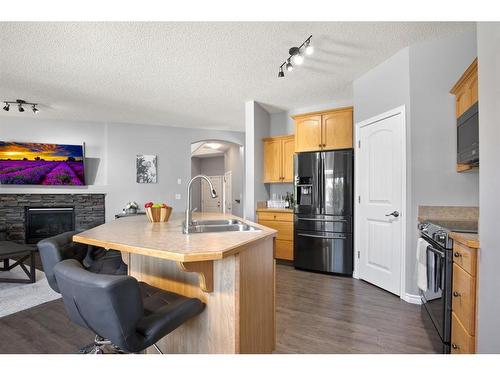 60 Jarvis Avenue, Red Deer, AB - Indoor Photo Showing Kitchen With Stainless Steel Kitchen With Double Sink