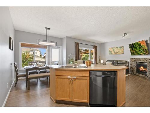 60 Jarvis Avenue, Red Deer, AB - Indoor Photo Showing Other Room With Fireplace