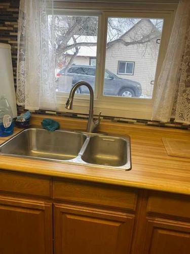 5007 48 Street, Hardisty, AB - Indoor Photo Showing Kitchen With Double Sink