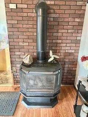 5007 48 Street, Hardisty, AB - Indoor Photo Showing Other Room With Fireplace