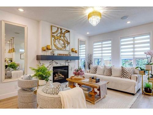 191 Cranston Gate Se, Calgary, AB - Indoor Photo Showing Living Room With Fireplace