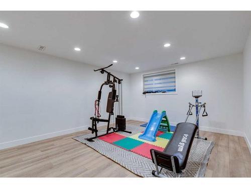 191 Cranston Gate Se, Calgary, AB - Indoor Photo Showing Gym Room