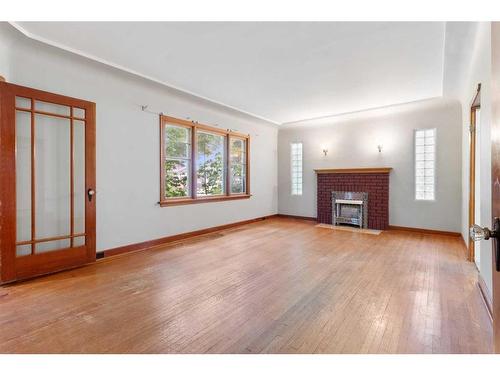 5305 48 Ave, Wetaskiwin, AB - Indoor Photo Showing Living Room With Fireplace