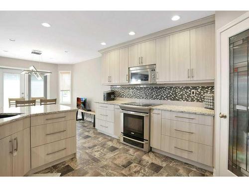 64 Daines Avenue, Red Deer, AB - Indoor Photo Showing Kitchen With Upgraded Kitchen