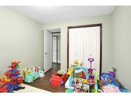 64 Daines Avenue, Red Deer, AB - Indoor Photo Showing Bedroom