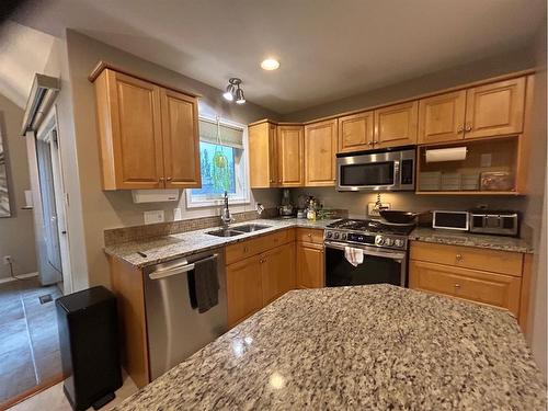 6117 32 Avenue, Camrose, AB - Indoor Photo Showing Kitchen With Double Sink