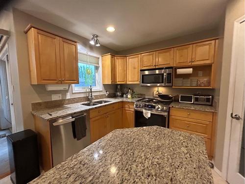 6117 32 Avenue, Camrose, AB - Indoor Photo Showing Kitchen With Double Sink