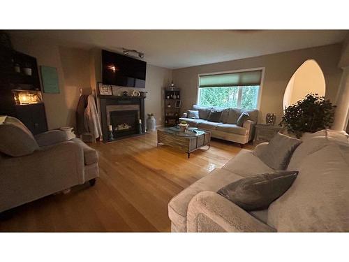 6117 32 Avenue, Camrose, AB - Indoor Photo Showing Living Room With Fireplace