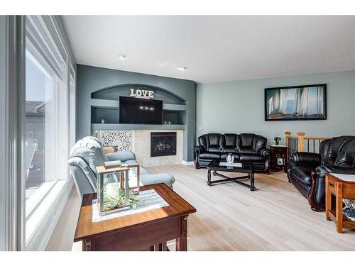 39 Daniel Crescent, Red Deer, AB - Indoor Photo Showing Living Room With Fireplace