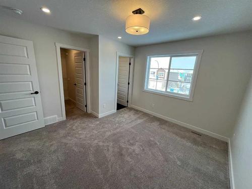 211 Lewiston Drive Ne, Calgary, AB - Indoor Photo Showing Other Room