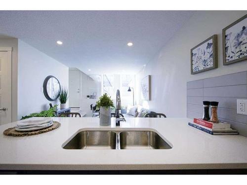 712-135 Mahogany Parade Se, Calgary, AB - Indoor Photo Showing Kitchen With Double Sink