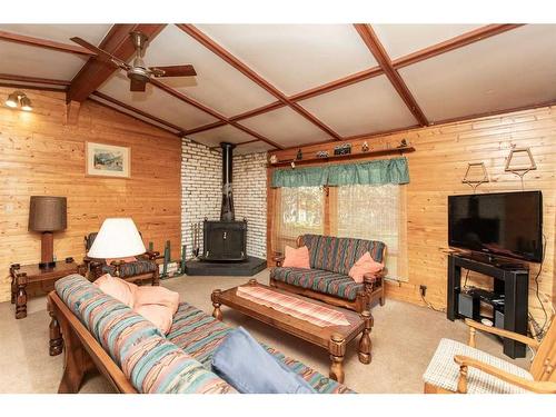 224-41124 Range Road 282 Range, Gull Lake, AB - Indoor Photo Showing Living Room With Fireplace