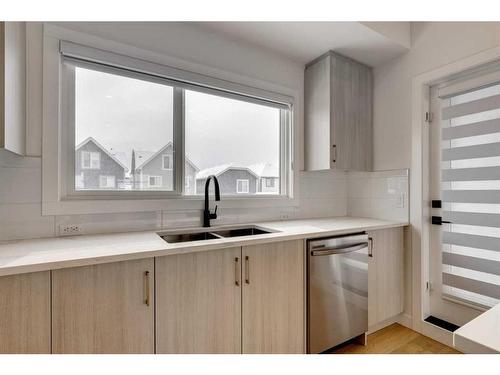 332-903 Mahogany Boulevard Se, Calgary, AB - Indoor Photo Showing Kitchen With Double Sink