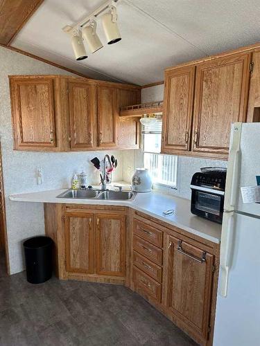 3017 35468 Range Road 30, Rural Red Deer County, AB - Indoor Photo Showing Kitchen With Double Sink