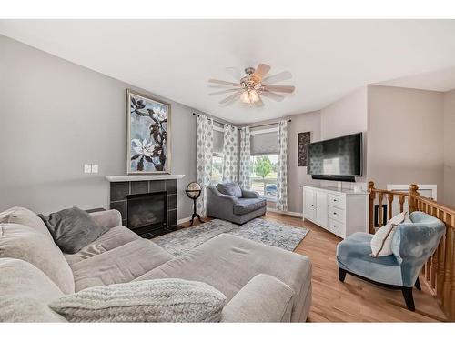 262 Inglewood Drive, Red Deer, AB - Indoor Photo Showing Living Room With Fireplace