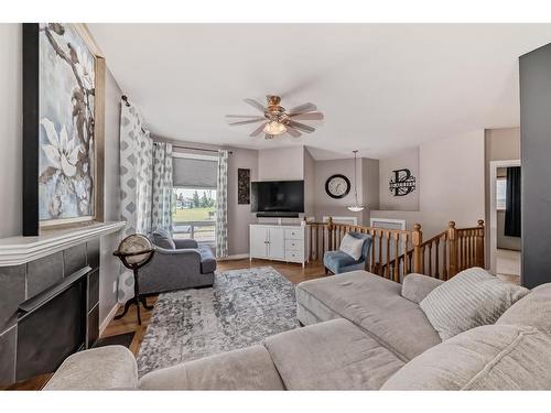 262 Inglewood Drive, Red Deer, AB - Indoor Photo Showing Living Room With Fireplace