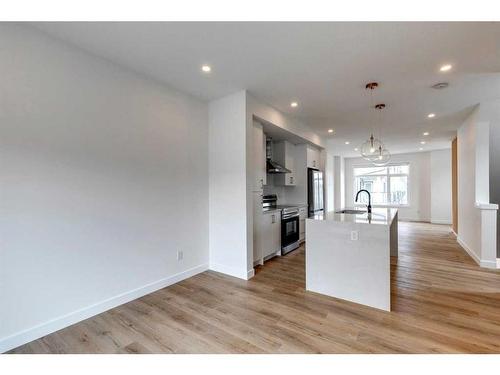 16-903 Mahogany Boulevard Se, Calgary, AB - Indoor Photo Showing Kitchen With Upgraded Kitchen