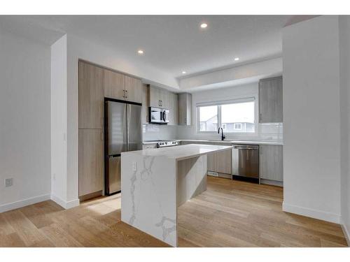 16-903 Mahogany Boulevard Se, Calgary, AB - Indoor Photo Showing Kitchen With Upgraded Kitchen