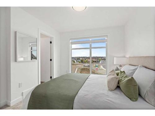 14-903 Mahogany Boulevard Se, Calgary, AB - Indoor Photo Showing Bedroom