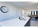 199 Vantage Drive Drive, Cochrane, AB  - Indoor Photo Showing Kitchen With Double Sink 