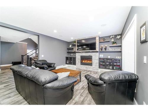 75 Valli Close, Sylvan Lake, AB - Indoor With Fireplace