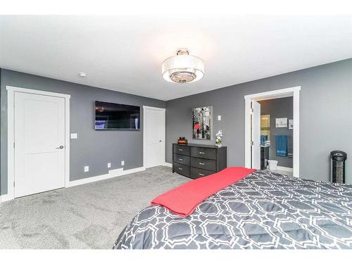 75 Valli Close, Sylvan Lake, AB - Indoor Photo Showing Bedroom