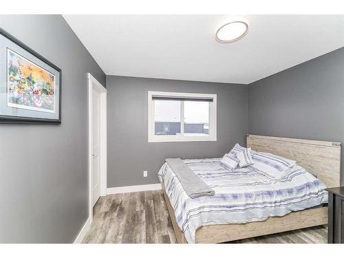 75 Valli Close, Sylvan Lake, AB - Indoor Photo Showing Bedroom