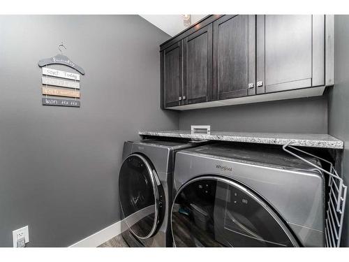 75 Valli Close, Sylvan Lake, AB - Indoor Photo Showing Laundry Room