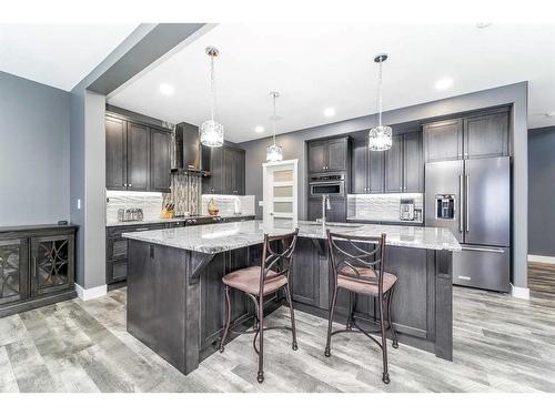 75 Valli Close, Sylvan Lake, AB - Indoor Photo Showing Kitchen With Stainless Steel Kitchen With Upgraded Kitchen