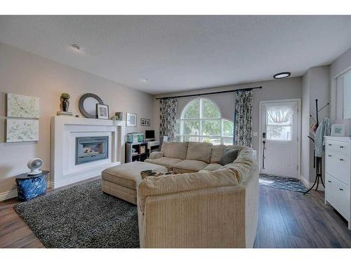 111 Anquetel Street, Red Deer, AB - Indoor Photo Showing Living Room With Fireplace