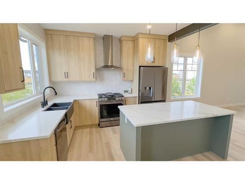 60 Thorkman Avenue, Red Deer, AB - Indoor Photo Showing Kitchen With Double Sink With Upgraded Kitchen