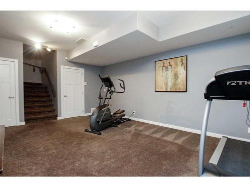 121 Traptow Close, Red Deer, AB - Indoor Photo Showing Gym Room