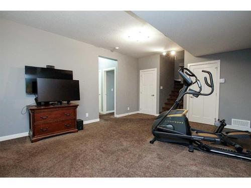 121 Traptow Close, Red Deer, AB - Indoor Photo Showing Gym Room