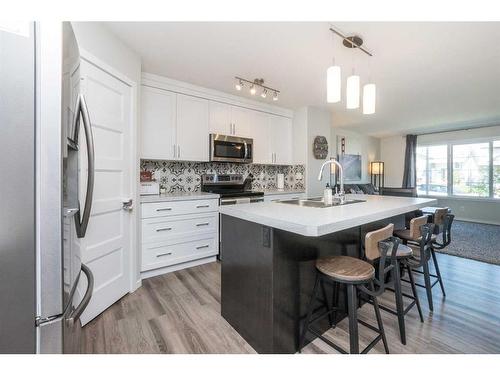 204 Thomlison Avenue, Red Deer, AB - Indoor Photo Showing Kitchen With Upgraded Kitchen