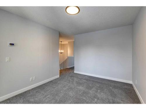 351 Hotchkiss Manor Se, Calgary, AB - Indoor Photo Showing Other Room