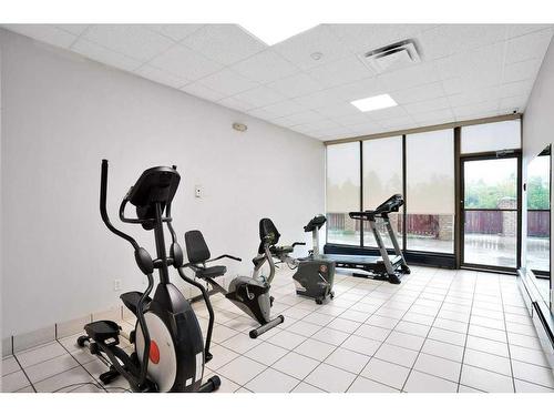 1011-4902 37 Street, Red Deer, AB - Indoor Photo Showing Gym Room