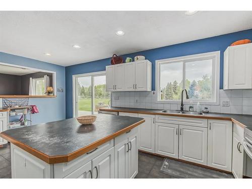 412 Lobstick Trail, Rural Clearwater County, AB - Indoor Photo Showing Kitchen With Double Sink