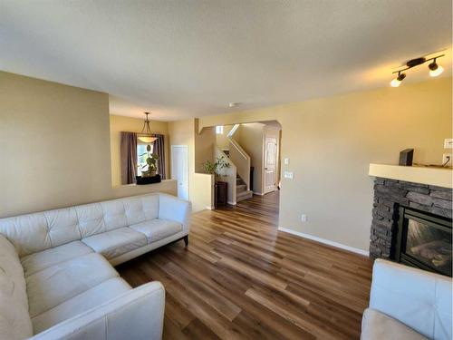 41 Juniper Close, Red Deer, AB - Indoor Photo Showing Living Room With Fireplace