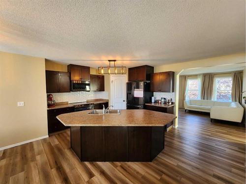 41 Juniper Close, Red Deer, AB - Indoor Photo Showing Kitchen With Double Sink