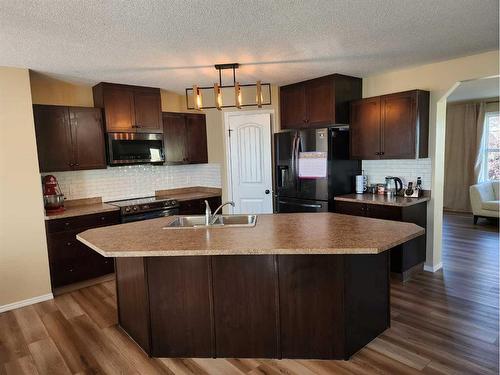 41 Juniper Close, Red Deer, AB - Indoor Photo Showing Kitchen With Double Sink