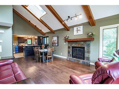 6-38261 Range Road 261, Rural Red Deer County, AB - Indoor Photo Showing Living Room With Fireplace