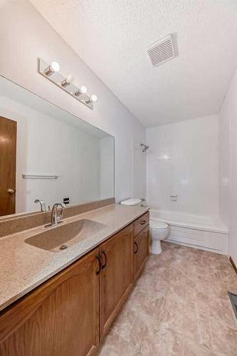 222 Cedarwood Park Sw, Calgary, AB - Indoor Photo Showing Bathroom