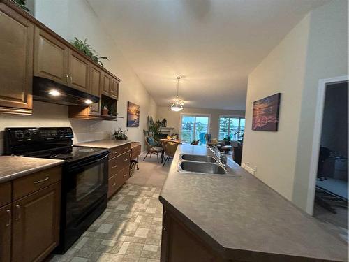 4527 71 Street Close, Camrose, AB - Indoor Photo Showing Kitchen With Double Sink