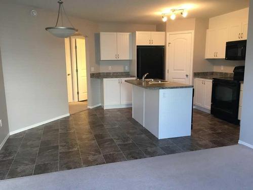 612-31 Jamieson Avenue, Red Deer, AB - Indoor Photo Showing Kitchen