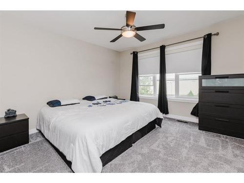 137 Hampton Crescent, Sylvan Lake, AB - Indoor Photo Showing Bedroom